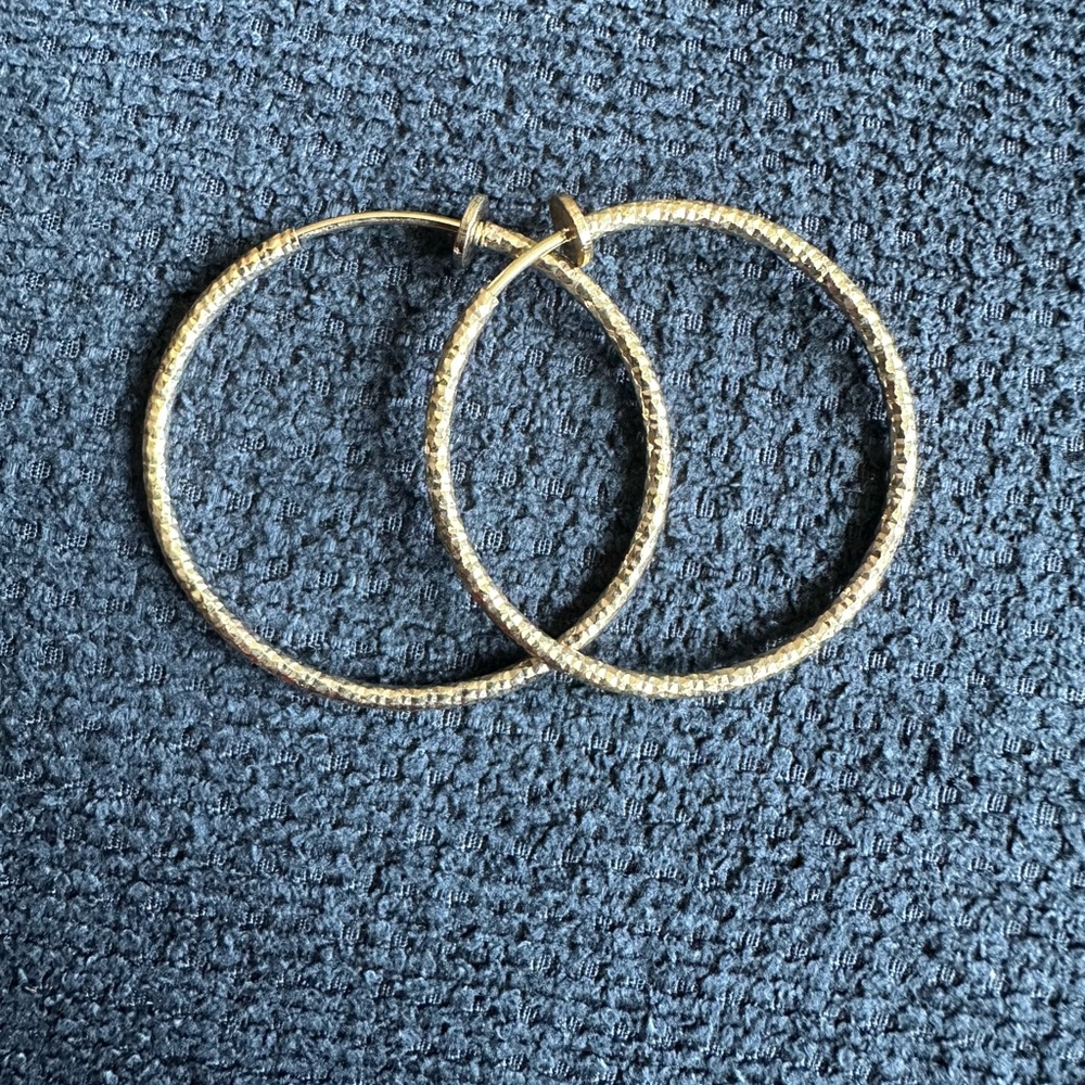 Golden hoops for unpierced ears